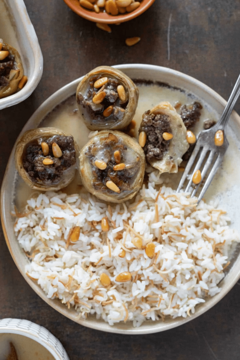 Stuffed Artichoke Bottoms Made Easy with One Great Recipe 16 Stuffed artichoke bottoms with pine nuts served with rice.